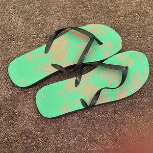 Green and Black Flip Flops